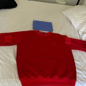 Nike sweatshirt size extra large, but his run small more fit like large